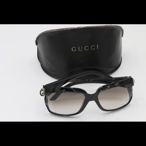 Women’s  Gucci Sunglasses. Color is Black